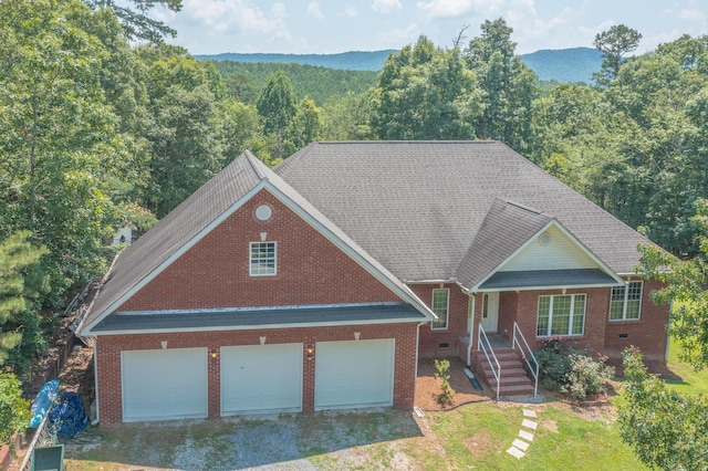 1103 Monroe Green Rd, Trion, GA 30753 - traditional home with a forest view, covered porch, brick siding, gravel driveway, and a shingled roof