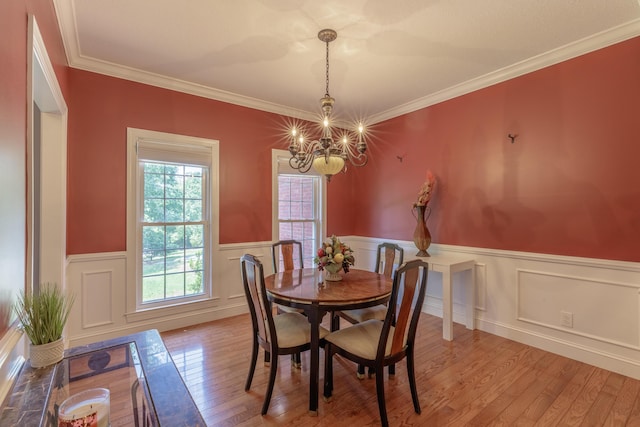 1103 Monroe Green Rd, Trion, GA 30753 - dining area with a chandelier, a wainscoted wall, wood finished floors, and crown molding