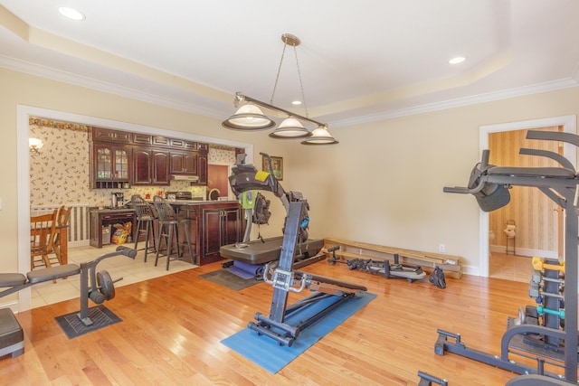 1103 Monroe Green Rd, Trion, GA 30753 - workout area with crown molding, a raised ceiling, light wood-style floors, and recessed lighting
