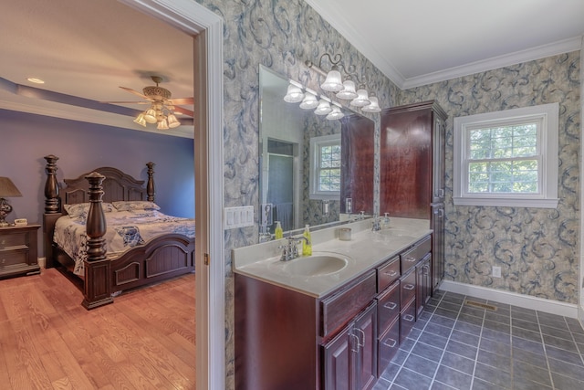 1103 Monroe Green Rd, Trion, GA 30753 - bathroom featuring healthy amount of natural light, crown molding, double vanity, ceiling fan, and wallpapered walls