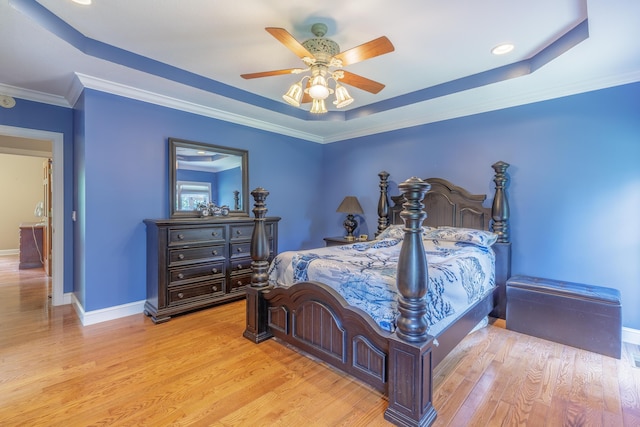 1103 Monroe Green Rd, Trion, GA 30753 - bedroom with light wood-style floors, a raised ceiling, a ceiling fan, ornamental molding, and recessed lighting