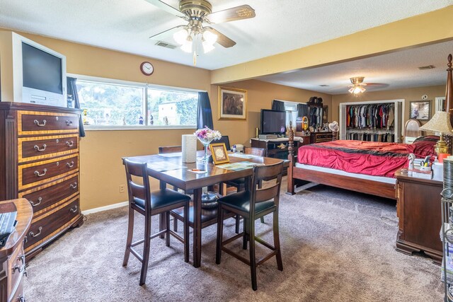 4433 Live Oak Ln, Chattanooga, TN 37411 - carpeted dining space with a ceiling fan and a textured ceiling
