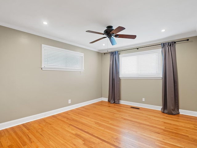 957 Elaine Trl, Chattanooga, TN 37421 - spare room featuring ornamental molding, ceiling fan, light wood-style floors, and recessed lighting