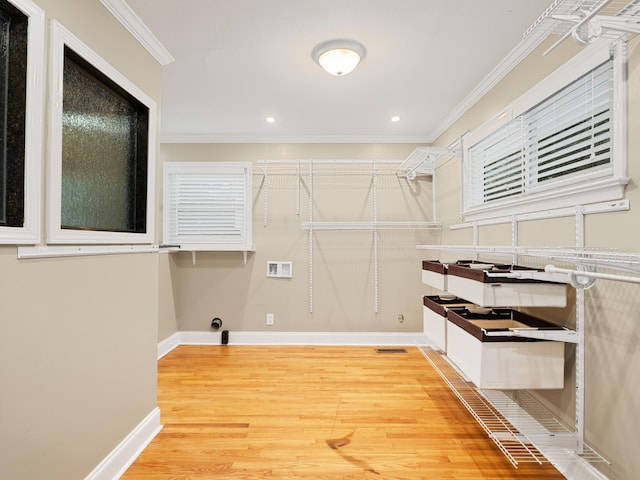 957 Elaine Trl, Chattanooga, TN 37421 - laundry room with ornamental molding, wood finished floors, recessed lighting, and washer hookup