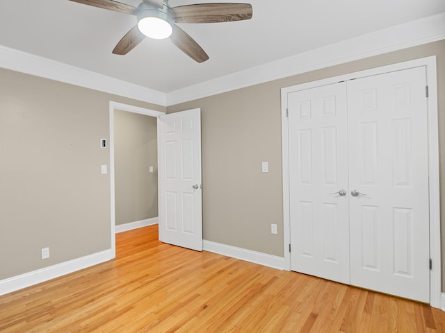 957 Elaine Trl, Chattanooga, TN 37421 - unfurnished bedroom with light wood-style floors, a closet, ornamental molding, and ceiling fan