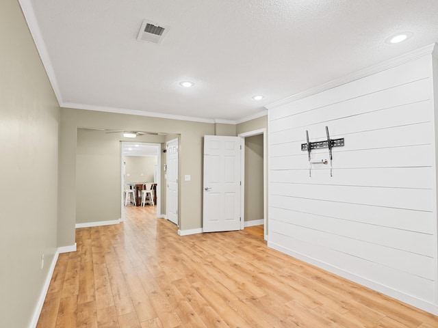 957 Elaine Trl, Chattanooga, TN 37421 - spare room with crown molding, light wood-style floors, recessed lighting, and a textured ceiling