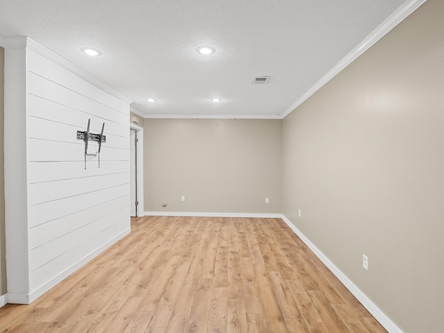 957 Elaine Trl, Chattanooga, TN 37421 - empty room featuring ornamental molding, recessed lighting, light wood-style flooring, and a textured ceiling