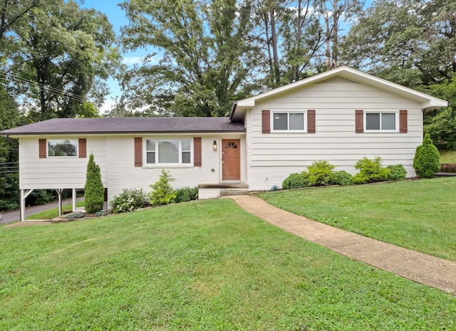 957 Elaine Trl, Chattanooga, TN 37421 - tri-level home featuring a front yard and brick siding