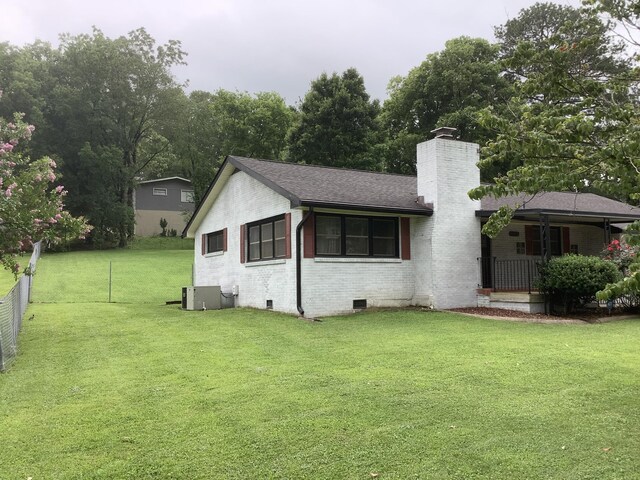 1322 Vance Rd, Chattanooga, TN 37421 - view of front of property with a chimney, brick siding, a shingled roof, and crawl space
