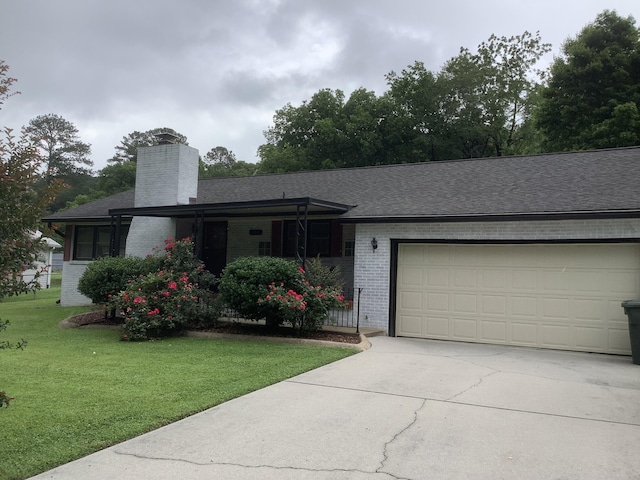1322 Vance Rd, Chattanooga, TN 37421 - ranch-style house featuring concrete driveway, brick siding, an attached garage, a chimney, and a front lawn