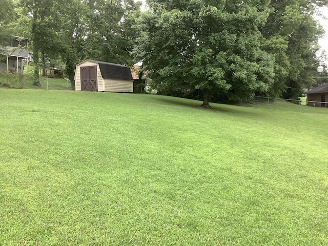1322 Vance Rd, Chattanooga, TN 37421 - view of yard featuring a shed and view of scattered trees
