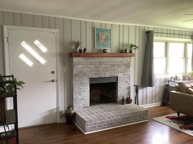 1322 Vance Rd, Chattanooga, TN 37421 - living area with wood finished floors, a fireplace, and crown molding