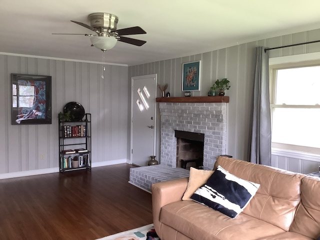 1322 Vance Rd, Chattanooga, TN 37421 - living area featuring wood finished floors, ornamental molding, ceiling fan, and a fireplace