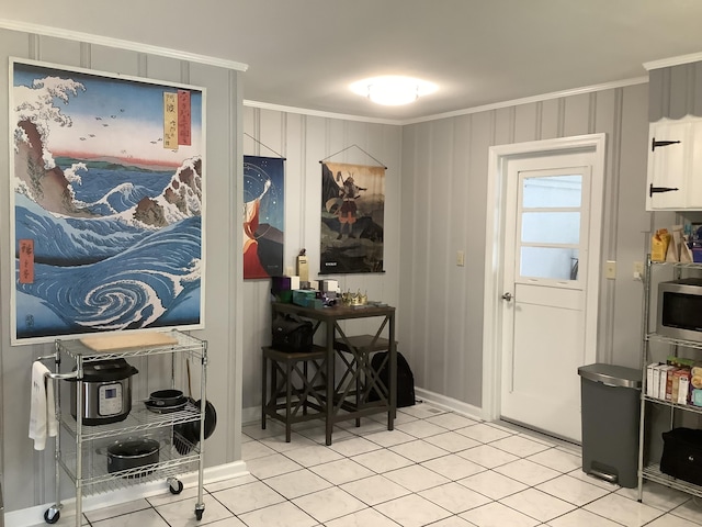 1322 Vance Rd, Chattanooga, TN 37421 - kitchen featuring ornamental molding, light tile patterned floors, and white cabinetry