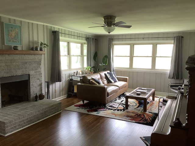 1322 Vance Rd, Chattanooga, TN 37421 - living room with ceiling fan, wood finished floors, a brick fireplace, and ornamental molding