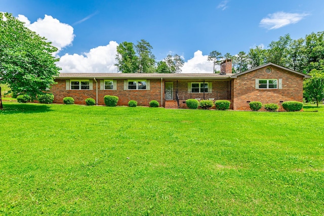 2046 N Concord Rd, Chattanooga, TN 37421 - ranch-style home featuring a chimney, a front lawn, brick siding, and covered porch