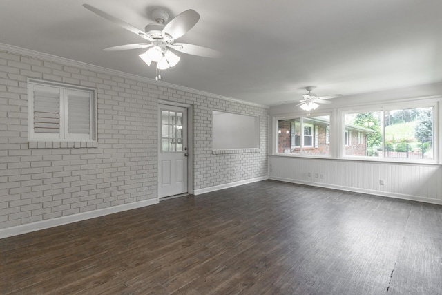 2046 N Concord Rd, Chattanooga, TN 37421 - spare room with a ceiling fan, dark wood-type flooring, brick wall, and crown molding