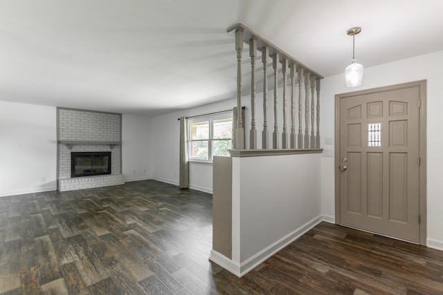 2046 N Concord Rd, Chattanooga, TN 37421 - entrance foyer with dark wood-type flooring and a fireplace