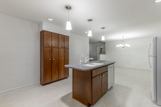 2046 N Concord Rd, Chattanooga, TN 37421 - kitchen featuring white appliances, a chandelier, decorative light fixtures, a kitchen island with sink, and recessed lighting