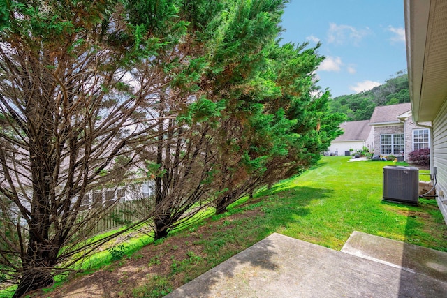 6239 Jacq Ct Unit 57, Hixson, TN 37343 - view of green lawn with a patio