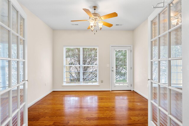 6239 Jacq Ct Unit 57, Hixson, TN 37343 - unfurnished room featuring wood finished floors and a ceiling fan