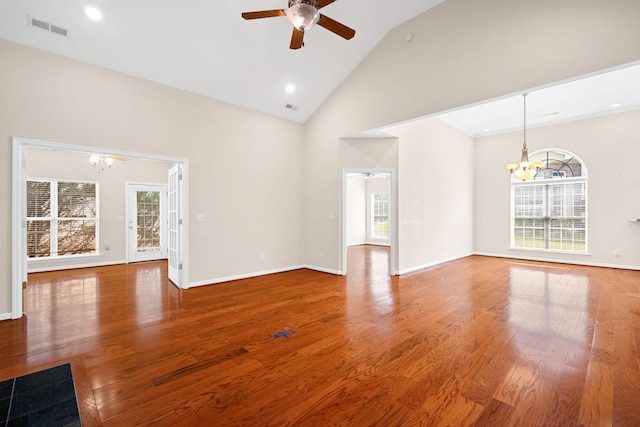 6239 Jacq Ct Unit 57, Hixson, TN 37343 - unfurnished living room featuring a chandelier, ceiling fan, healthy amount of natural light, high vaulted ceiling, and recessed lighting