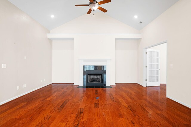 6239 Jacq Ct Unit 57, Hixson, TN 37343 - unfurnished living room with a ceiling fan, wood finished floors, high vaulted ceiling, and a tile fireplace