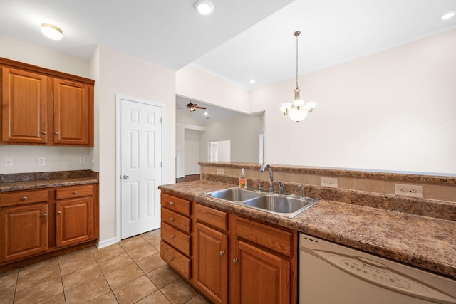 6239 Jacq Ct Unit 57, Hixson, TN 37343 - kitchen featuring white dishwasher, dark countertops, brown cabinetry, and light tile patterned floors