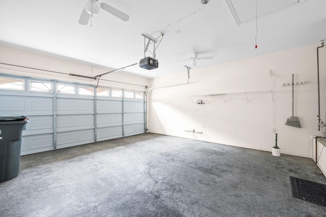 6239 Jacq Ct Unit 57, Hixson, TN 37343 - garage with ceiling fan and a garage door opener