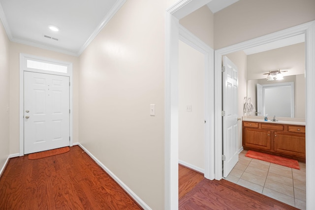 6239 Jacq Ct Unit 57, Hixson, TN 37343 - corridor with light wood-style flooring and ornamental molding