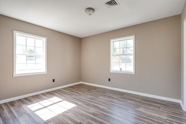 607 Parkview Dr, Chattanooga, TN 37411 - unfurnished room featuring healthy amount of natural light and wood finished floors