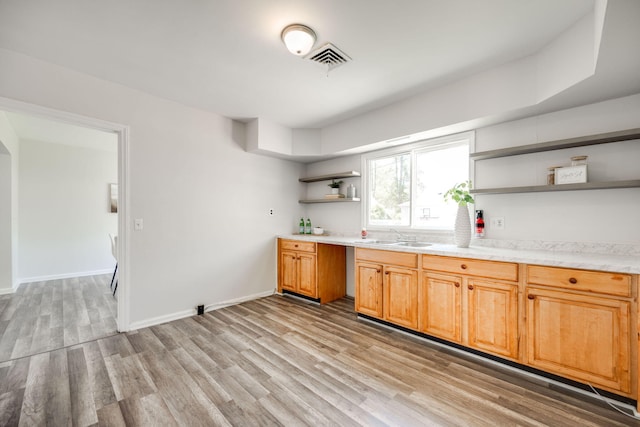607 Parkview Dr, Chattanooga, TN 37411 - kitchen with open shelves, light wood-type flooring, and light countertops