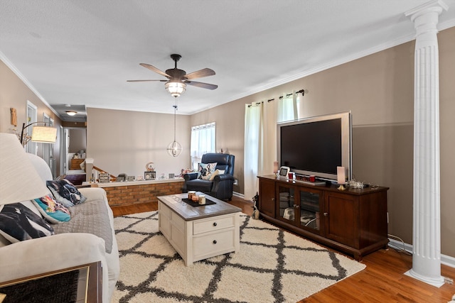 1008 Panorama Dr, Chattanooga, TN 37421 - living area with decorative columns, light wood-style floors, ornamental molding, and ceiling fan