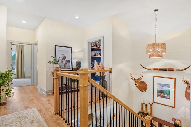 6822 Bacon Ln Unit B, Chattanooga, TN 37421 - corridor with an upstairs landing, a chandelier, light wood-style flooring, and recessed lighting