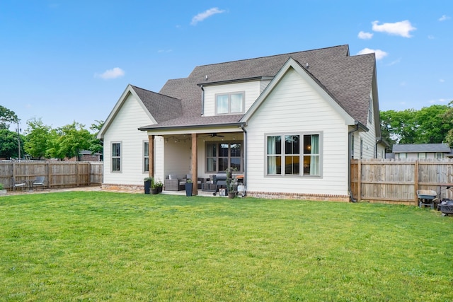 6822 Bacon Ln Unit B, Chattanooga, TN 37421 - back of property with a ceiling fan, an outdoor living space, a fenced backyard, roof with shingles, and a patio area
