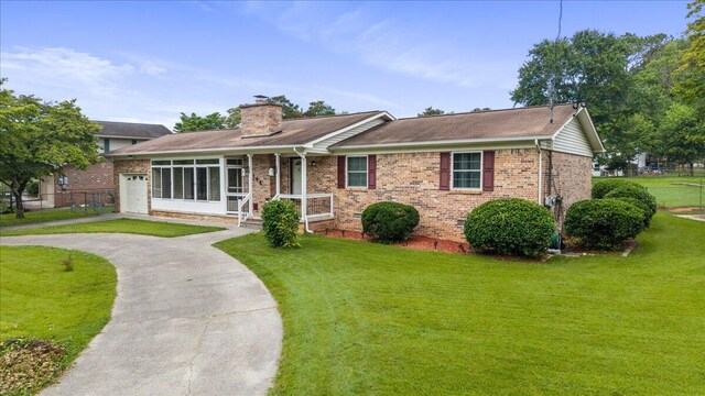 5146 Creek Bend Cir NW, Cleveland, TN 37312 - ranch-style home with covered porch, a front lawn, brick siding, and a chimney