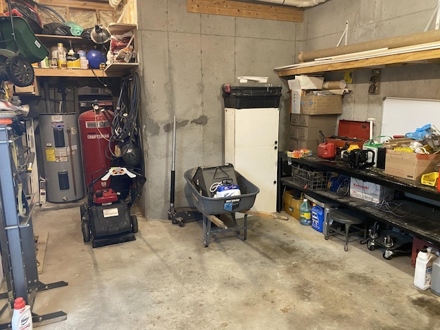 151 Holly Oak Ln, Ringgold, GA 30736 - basement featuring electric water heater and a workshop area