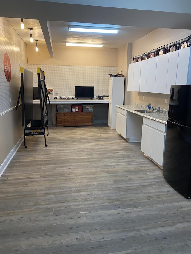 151 Holly Oak Ln, Ringgold, GA 30736 - kitchen featuring freestanding refrigerator, white cabinets, light countertops, and light wood-style floors