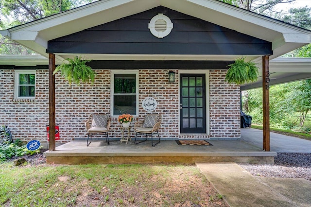 308 Pledger Pkwy, Lafayette, GA 30728 - doorway to property with brick siding and a patio