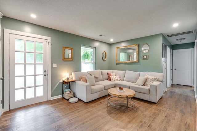 308 Pledger Pkwy, Lafayette, GA 30728 - living area with wood finished floors, recessed lighting, and a textured ceiling