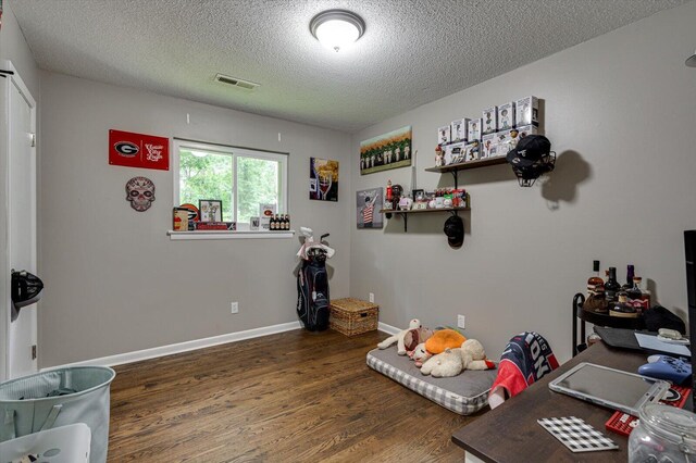 308 Pledger Pkwy, Lafayette, GA 30728 - office area featuring wood finished floors and a textured ceiling