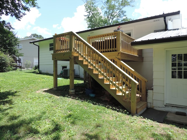 87 Lawrence Dr, Ringgold, GA 30736 - back of house featuring stairway, a deck, and a metal roof