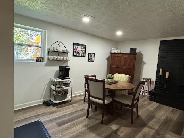 87 Lawrence Dr, Ringgold, GA 30736 - dining room with a textured ceiling and wood finished floors