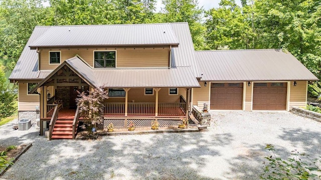 80 Tanya Ln, Dunlap, TN 37327 - rustic home with a porch, an attached garage, driveway, and a metal roof