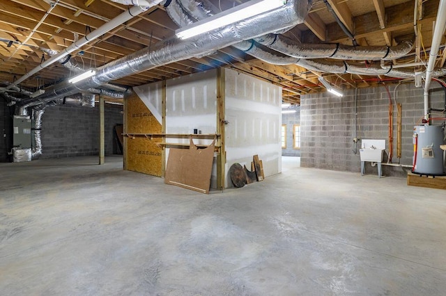 80 Tanya Ln, Dunlap, TN 37327 - unfinished below grade area with water heater, concrete block wall, and heating unit