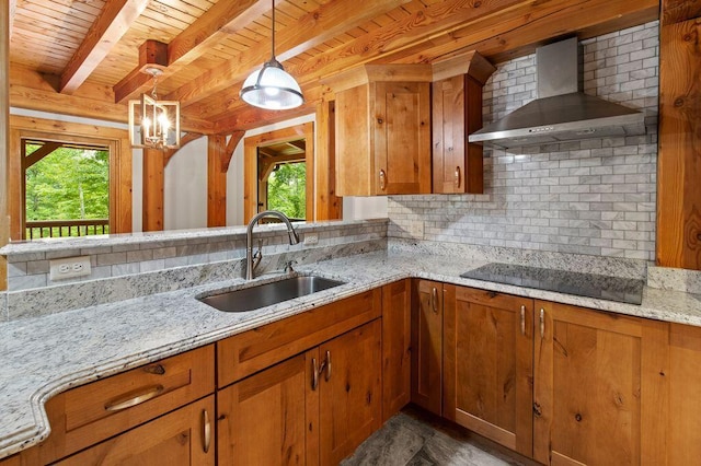 80 Tanya Ln, Dunlap, TN 37327 - kitchen with wall chimney range hood, brown cabinets, black electric cooktop, tasteful backsplash, and a wooden ceiling with exposed beams