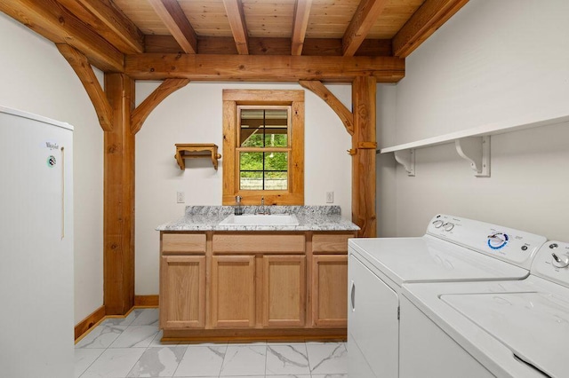 80 Tanya Ln, Dunlap, TN 37327 - laundry room with washing machine and clothes dryer, cabinet space, light marble finish floors, and wooden ceiling