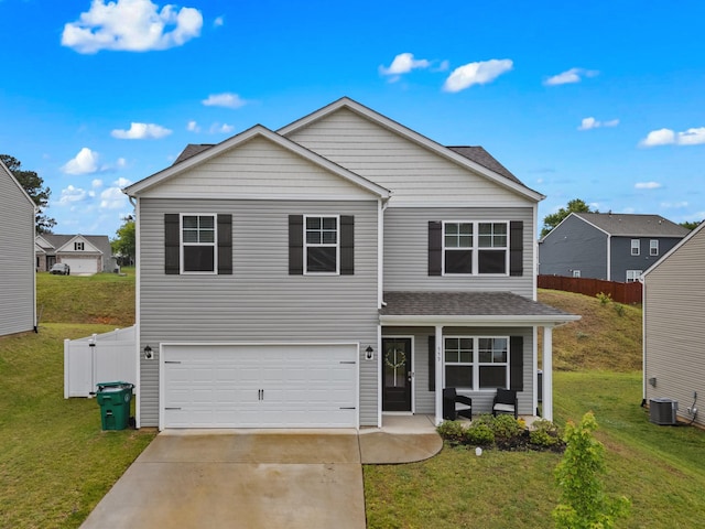 559 Cliff St, Morristown, TN 37814 - traditional home with an attached garage, covered porch, driveway, and roof with shingles