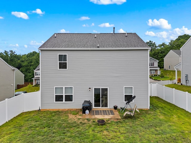 559 Cliff St, Morristown, TN 37814 - rear view of house with a fenced backyard, a patio, and a shingled roof
