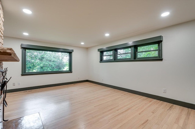 395 Robinson Ln, Decatur, TN 37322 - spare room featuring wood finished floors and recessed lighting